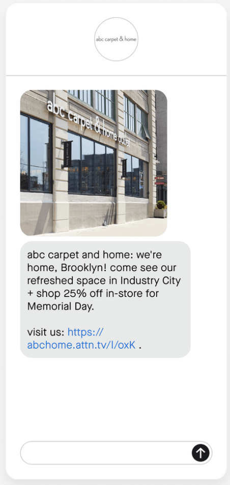 Example text message announcing the opening of a new physical location with a link to more information.