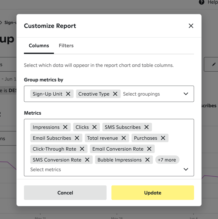 Selecting Group by metrics and metrics in the Columns tab of the Customize Report popup window.