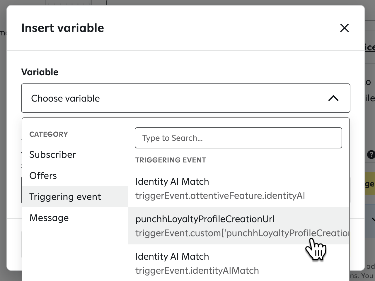Attentive's 'Insert variable' pop-up, with the 'Triggering event' category selected and 'punchhLoyaltyProfileCreationUrl' highlighted by a pointer.