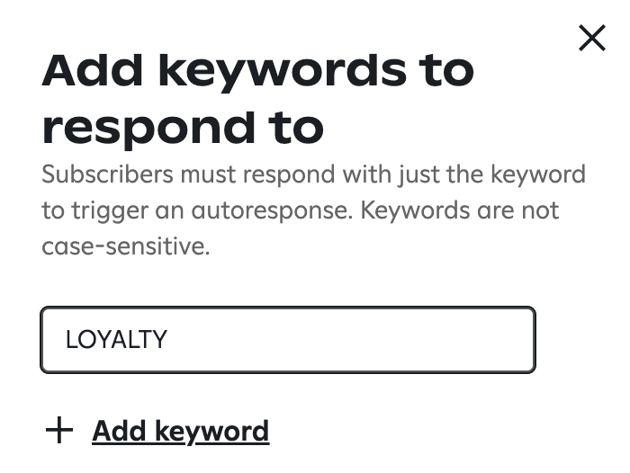 Attentive's 'Add keywords to respond to' pop-up with the keyword 'LOYALTY' entered into the text field.